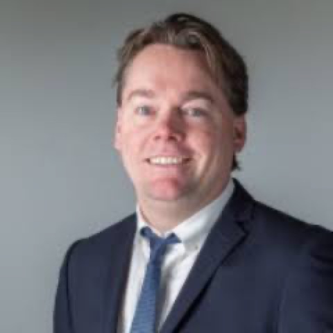 Headshot of Dr Sam Bartlett